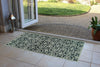 Atlantic Mats Jali Screen Green Curious Collection Ocean Mat Runner at a home doorway