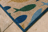 Close-up of a recycled Atlantic Mats doormat featuring a colorful fish shoal design