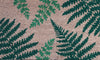Close-up of RHS Bloom Collection Coir Fern Doormat with green fern patterns on a natural coir base.