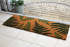 RHS Bloom Collection Coir Fern Runner by Atlantic Mats at a doorstep