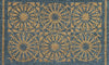 RHS Bloom Collection Coir Starburst Grey doormat with a golden sunburst pattern on grey.