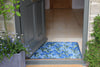 RHS Bloom Collection Ocean Mat Spring Garden blue floral doormat in a home entryway