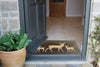 Washable brown Atlantic Mats doormat with deer design at a house entrance