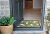 Atlantic Mats washable recycled doormat with a sheep design at a grey front door entrance