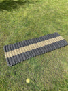 Extra large Atlantic Mats rope doormat with grey and natural stripes on green grass