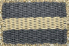 Atlantic Mats Natural Stripe Grey Outdoor Rope Doormat on a gravel surface