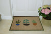 Atlantic Mats Plant Pots Ocean Mat featuring three stylized potted plants in front of a white door